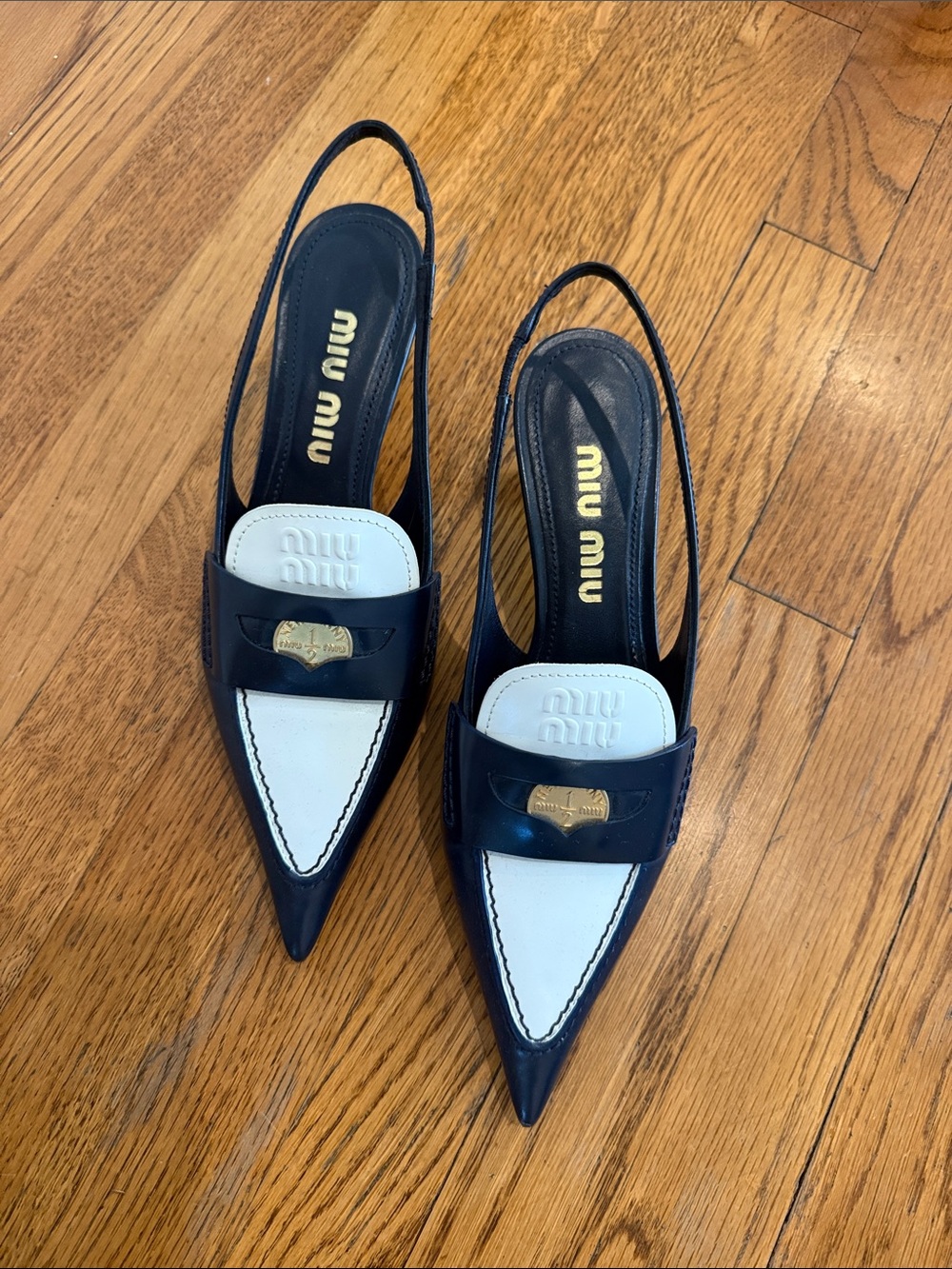 Miu Miu Black and White Pointed Slingback Mules